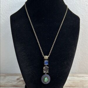 vintage Avon NRT pendant necklace with faux gemstones in an antiqued gold/bronze